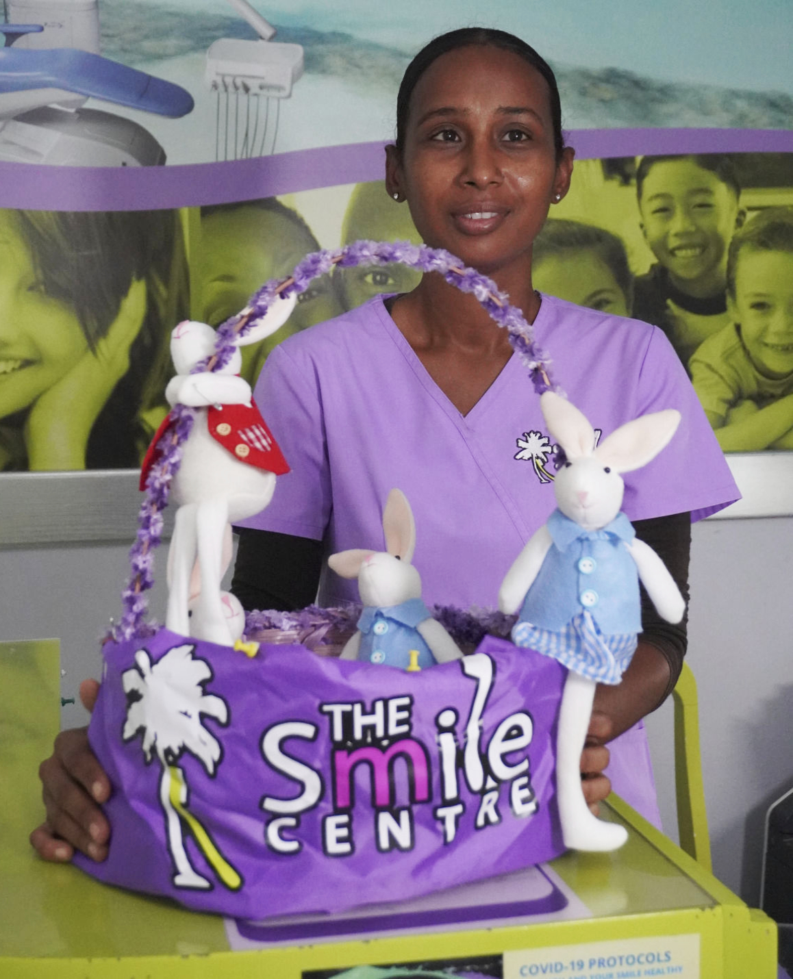 Employee with easter basket